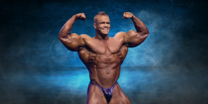 Dallas McCarver showing muscles